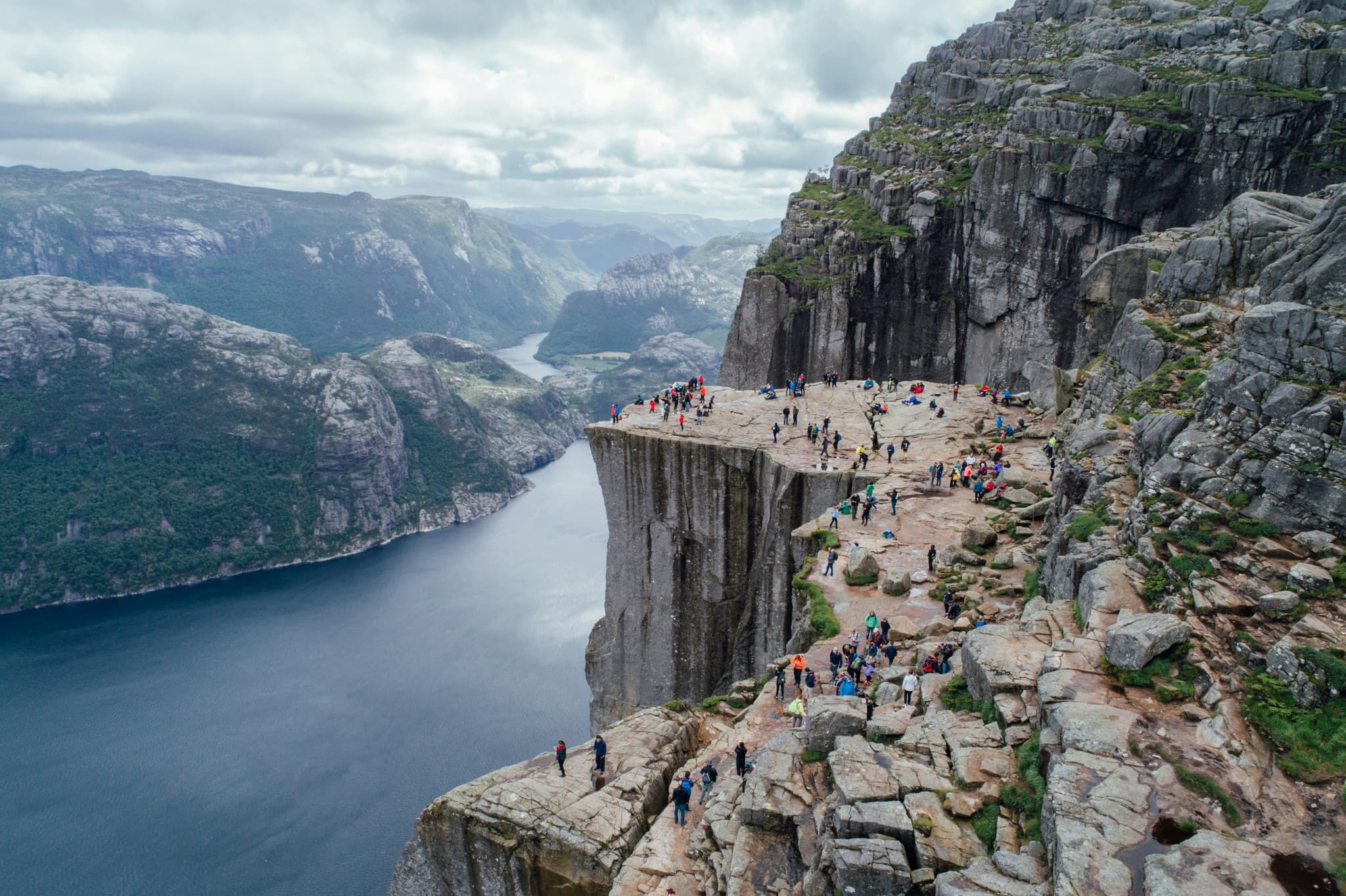 A high cliff platform surrounded by river and mountains