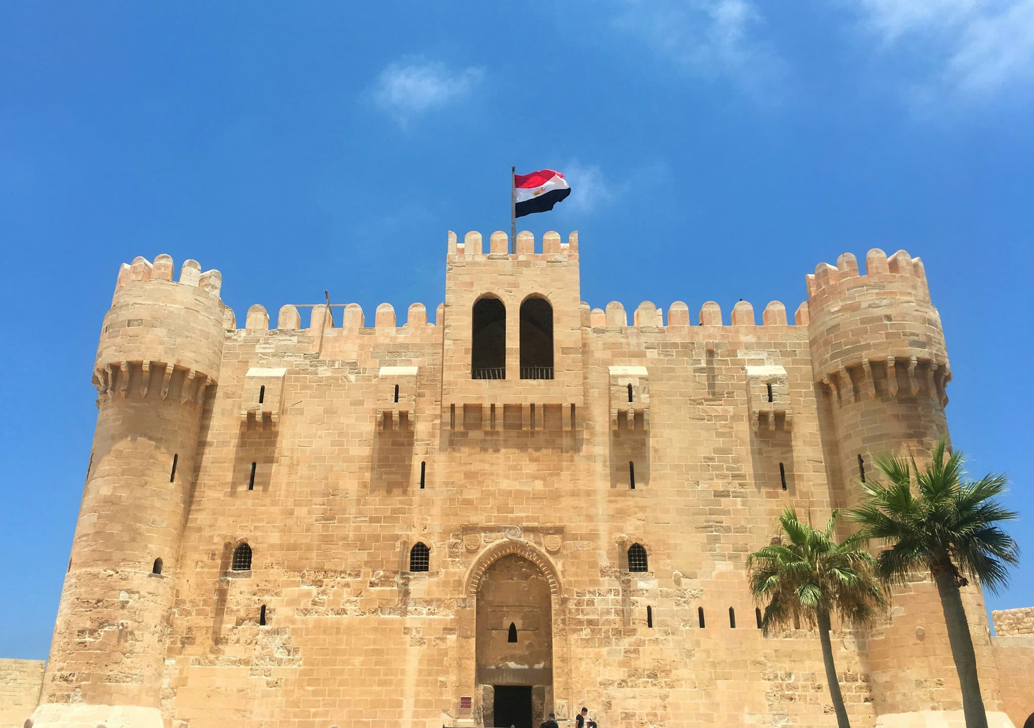 Ruin in Alexandria with Egyptian flag