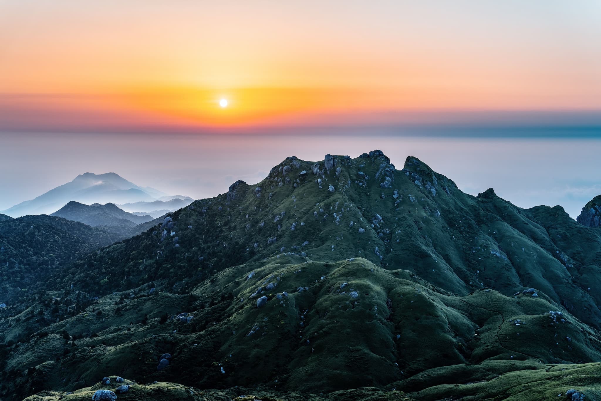 A green mountain during sunset in Yakushima