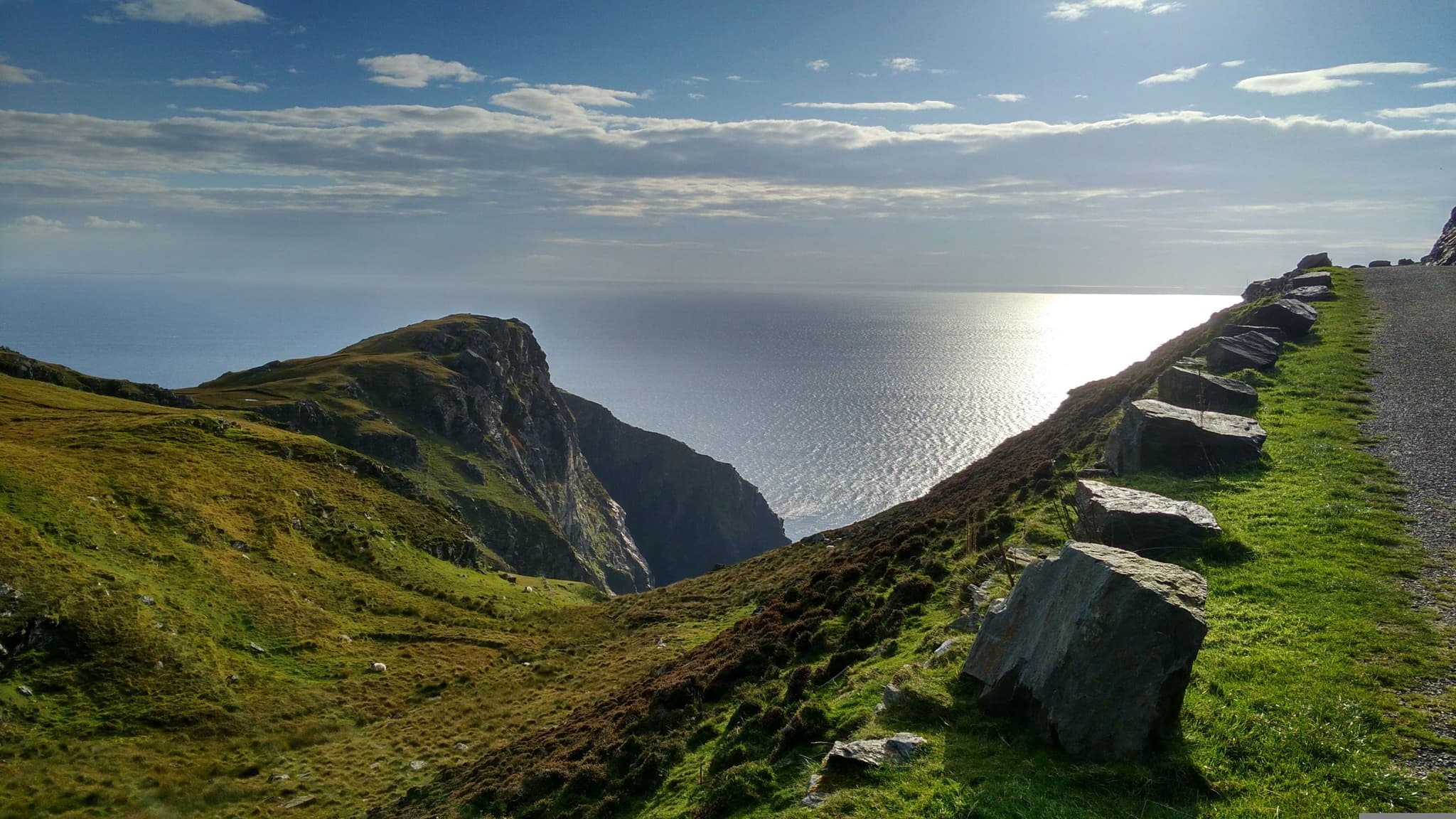 Green mountains near the sea of the Wild Atlantic Way.