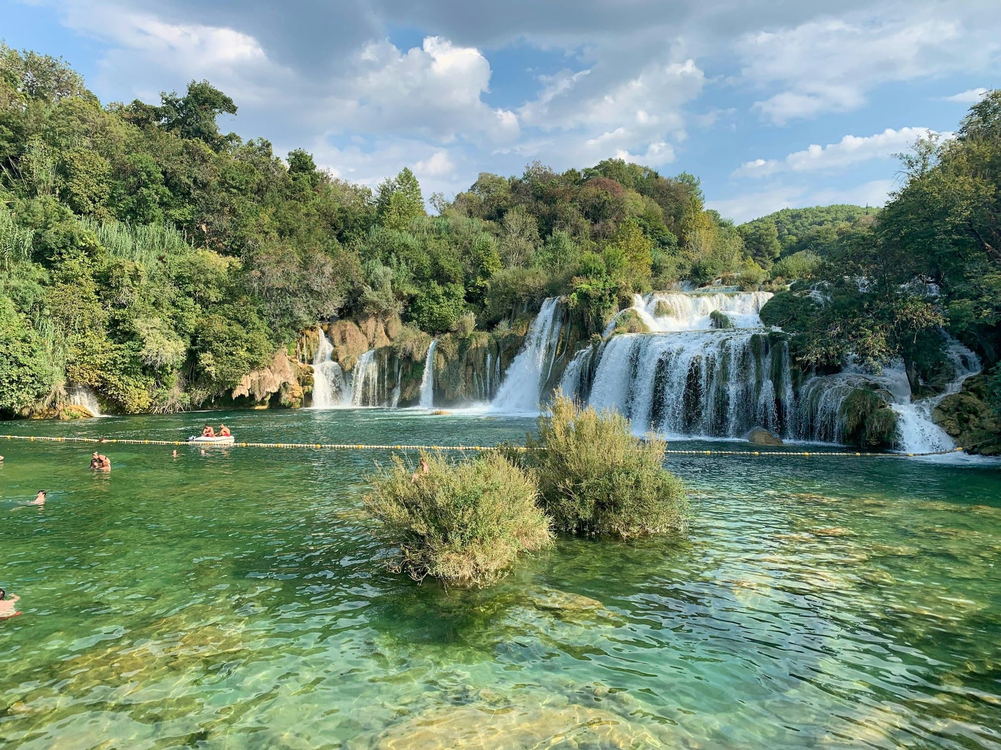 Visitors beside the waterfalls at Skradin in Krka National Park