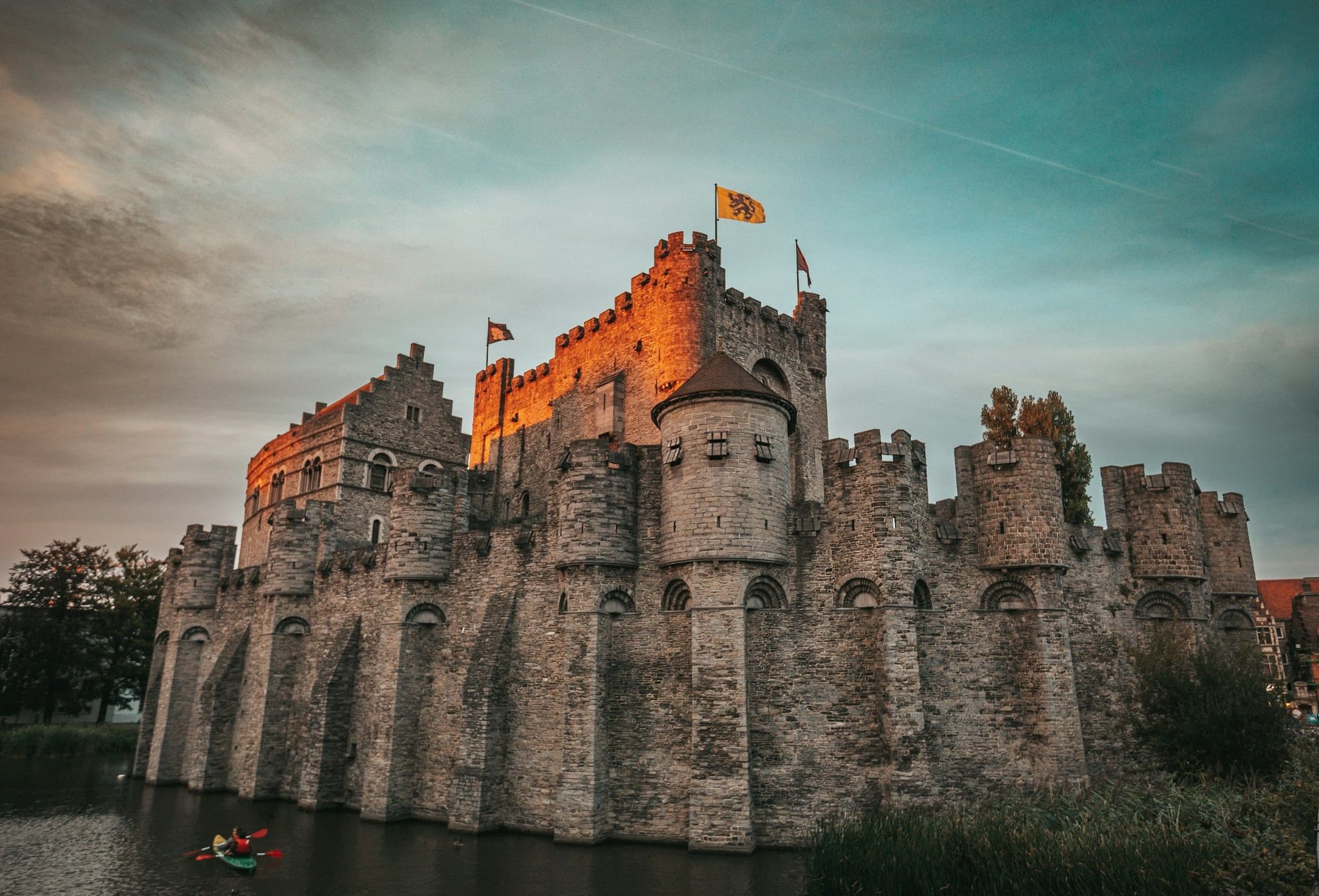The Gravensteen castle in Ghent rising above its moat