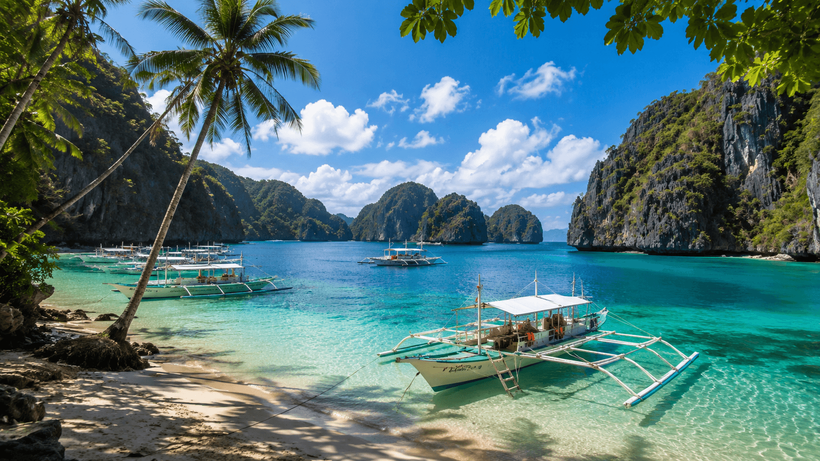 A bay with turqoise water and palm trees and cliffs in the background, a filipo white boat is floating in the water