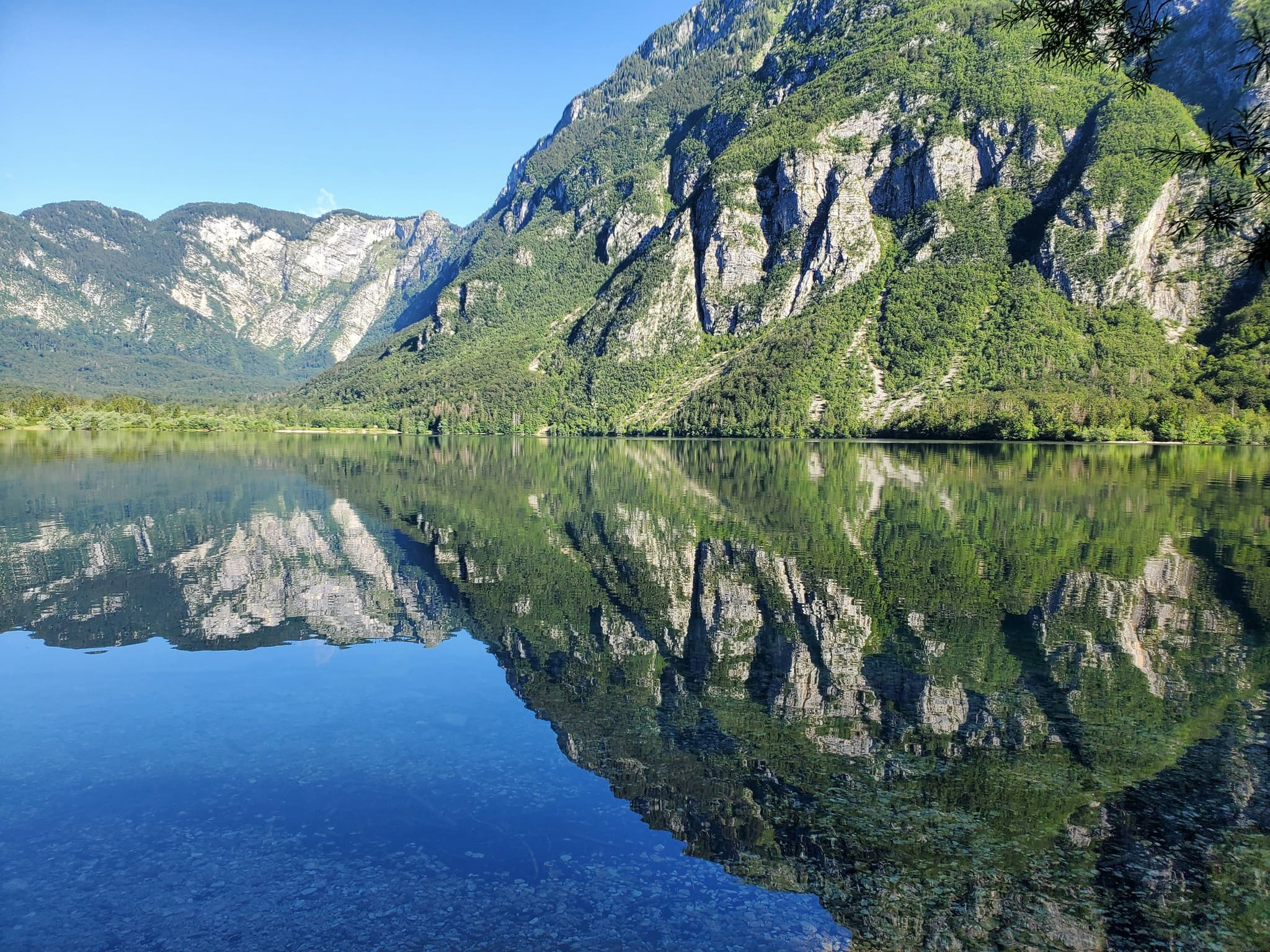 Lake with reflection of rocky mountain