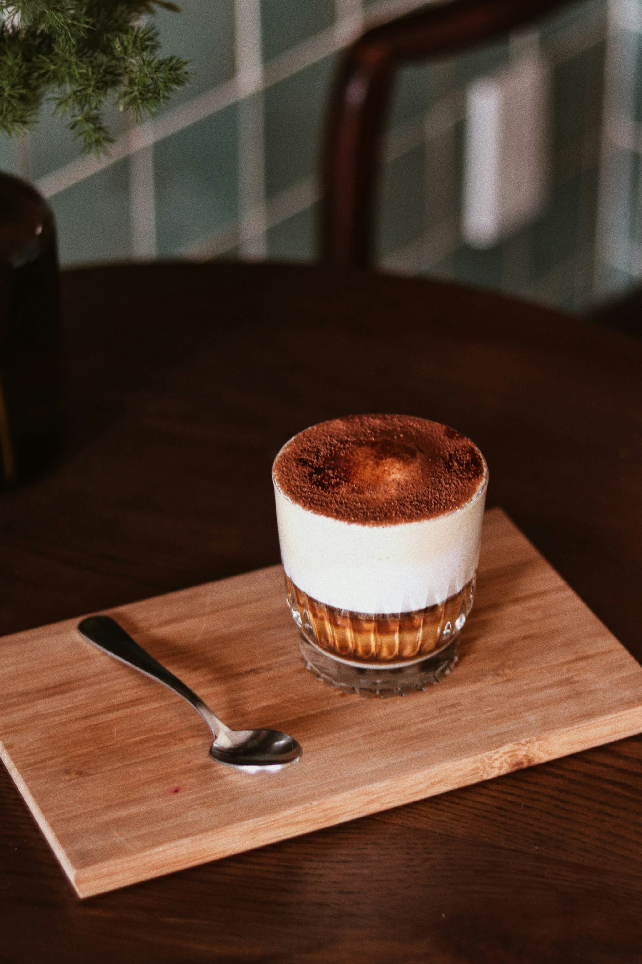 Egg coffee vietnames served on a wooden plate