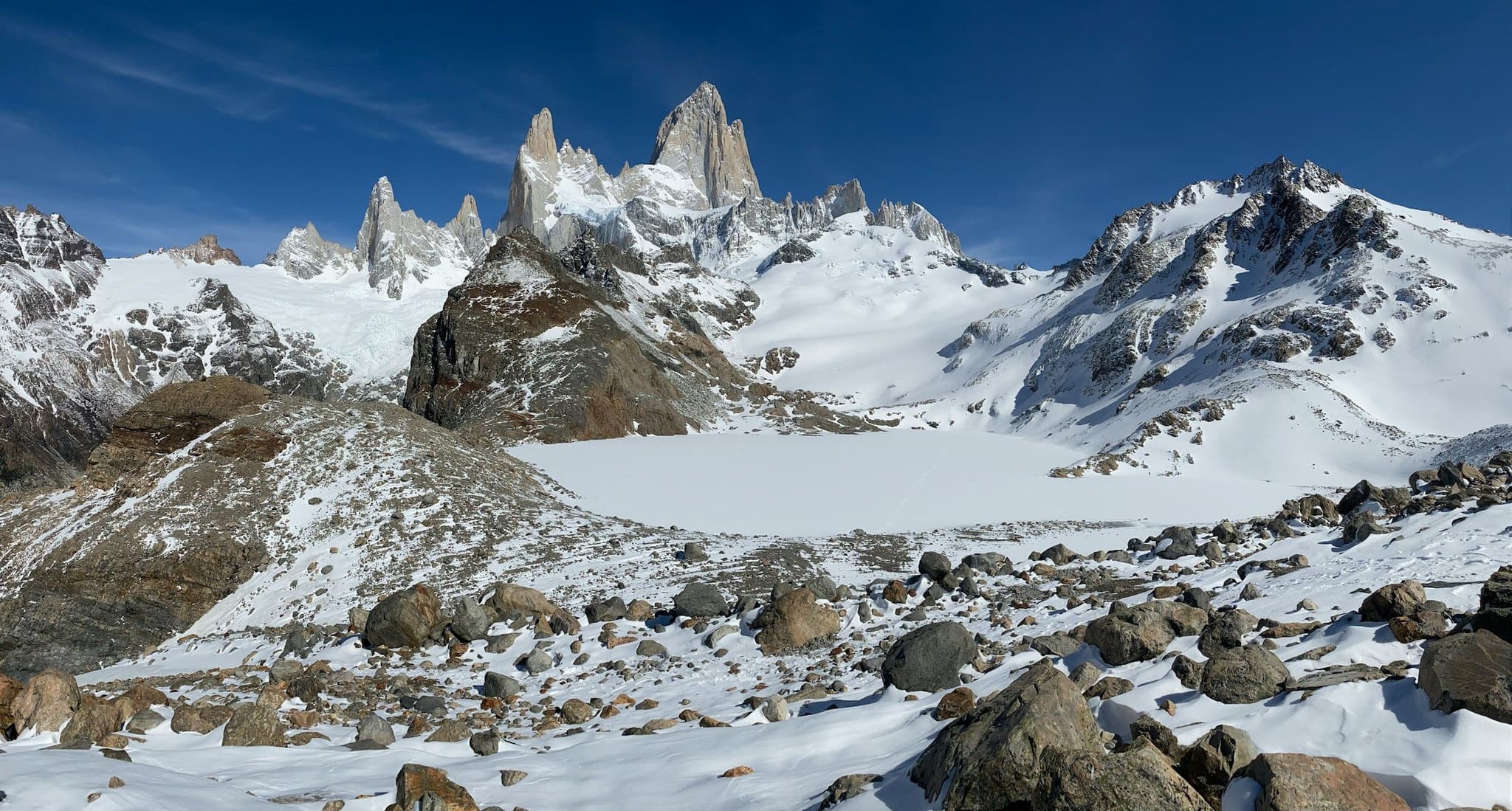 Frozen Laguna de los Tres below the snowy Fitz Roy massif