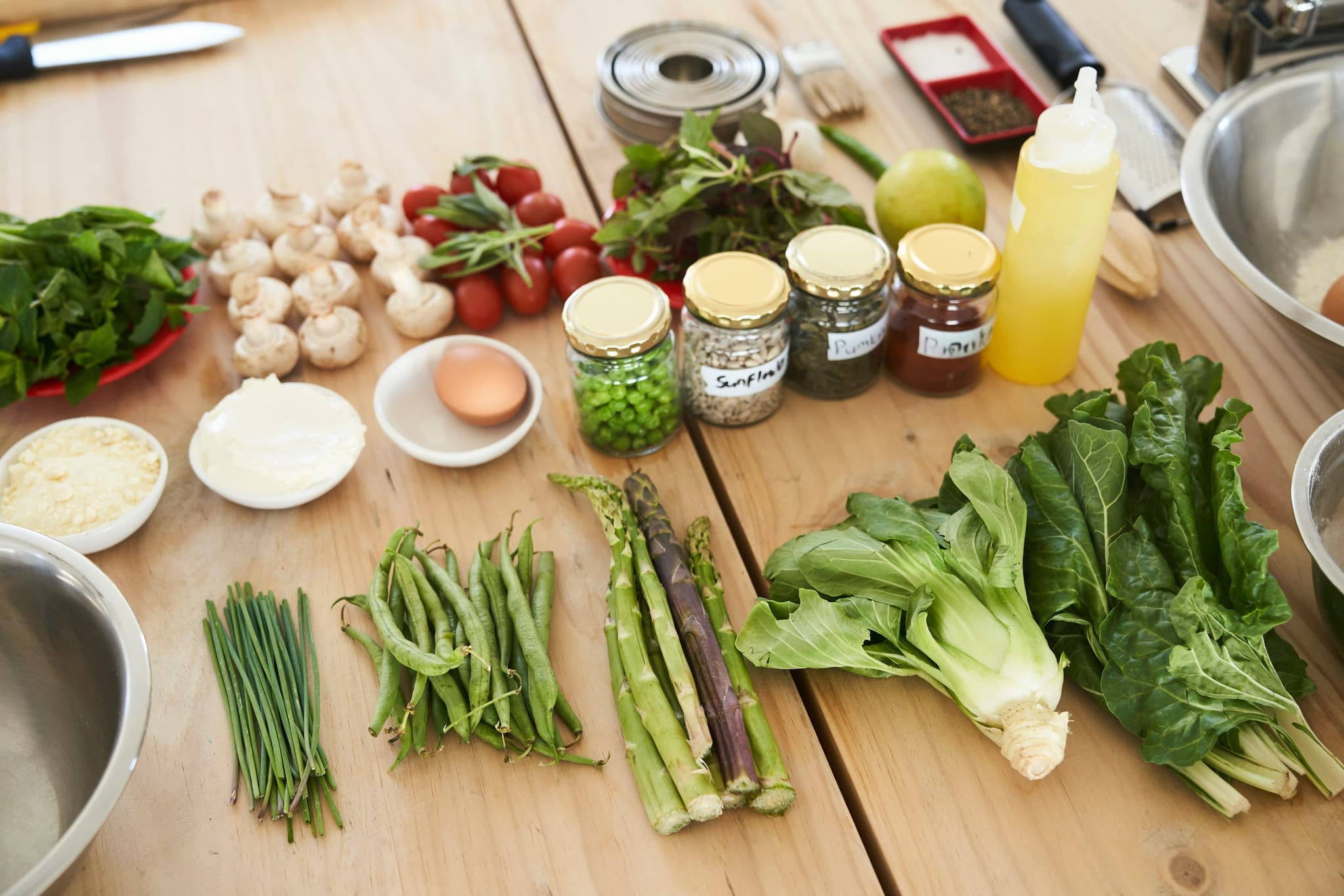 Fresh ingredients laid out for a Thai cooking class