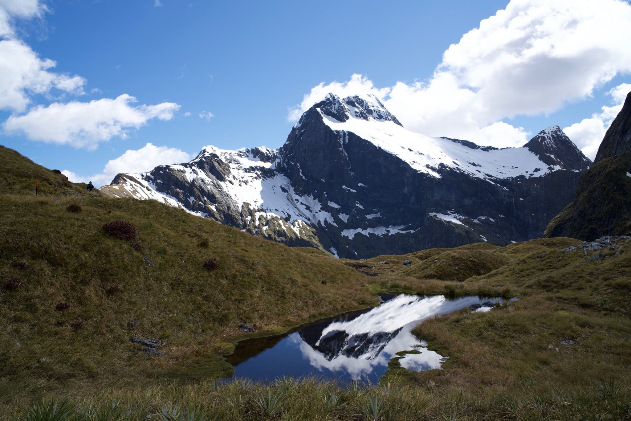 Milford Track snow peaked mountains and rocks