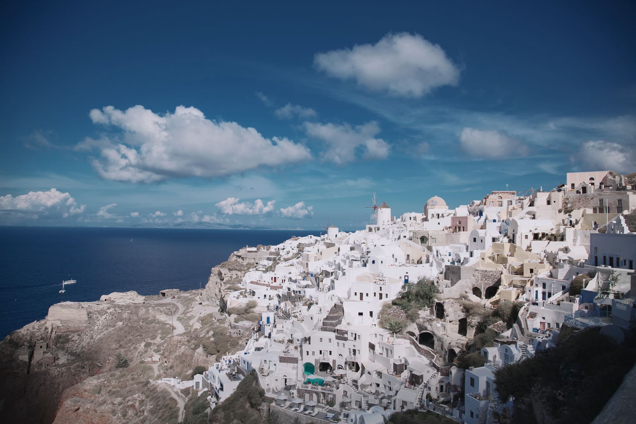 Whitewashed buildings overlooking the sea in Oia, Santorini