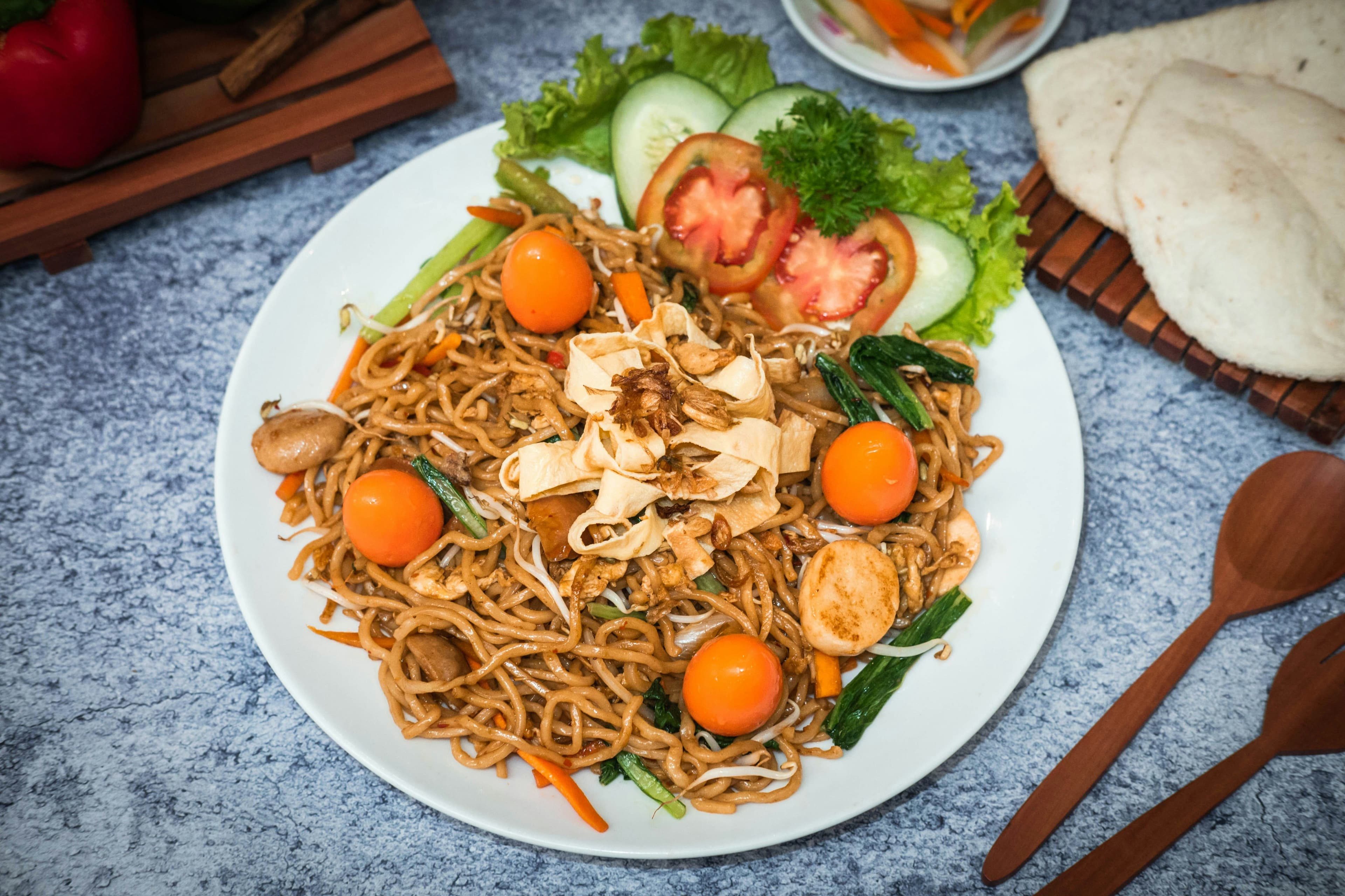A picture of mie goreng served on a plate
