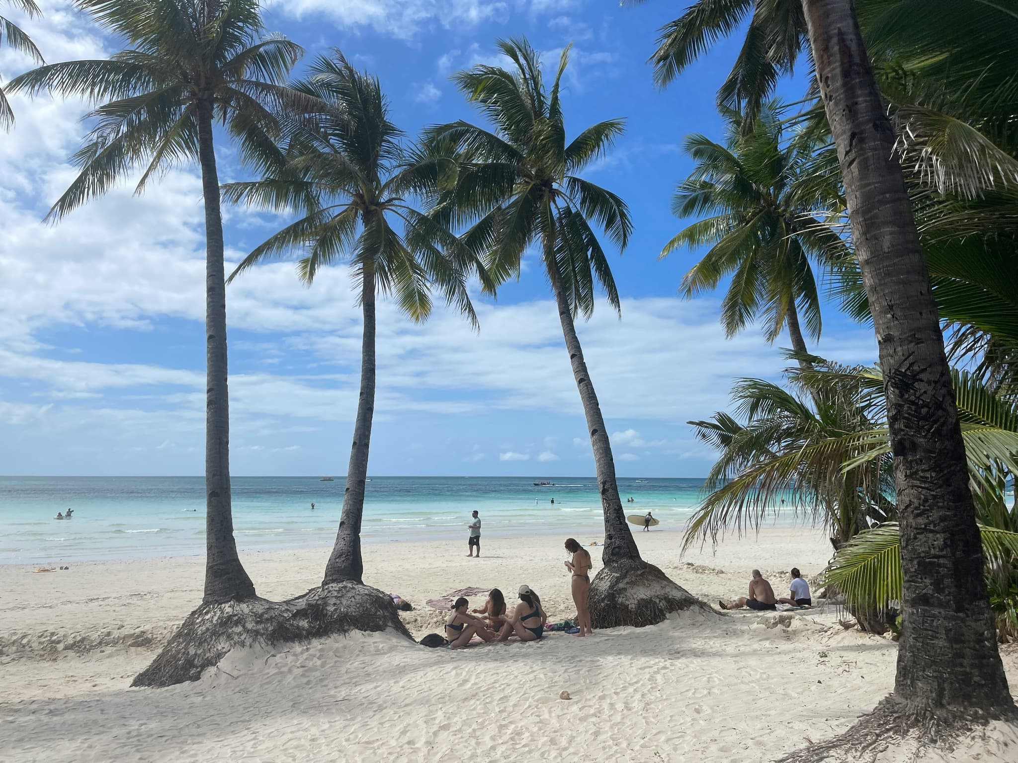 Boracay White sandy Beach with palm trees in Philippines