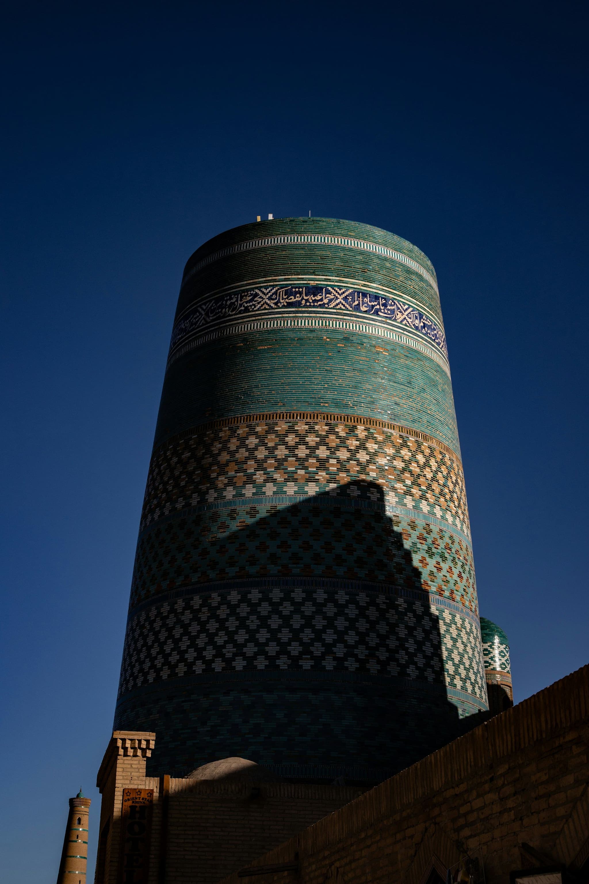 Kalta Minor minaret in Khiva with its turquoise and green tiles