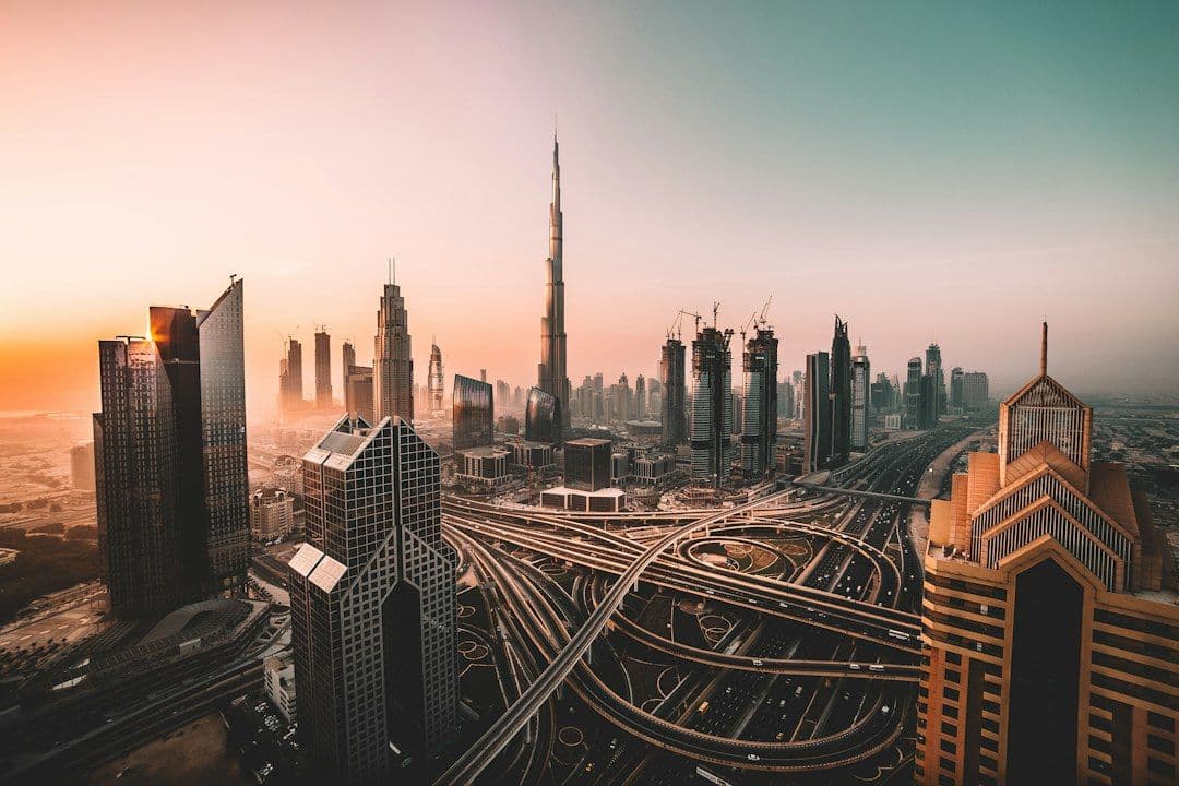 The Burj Khalifa rising above the Downtown Dubai skyline at sunrise