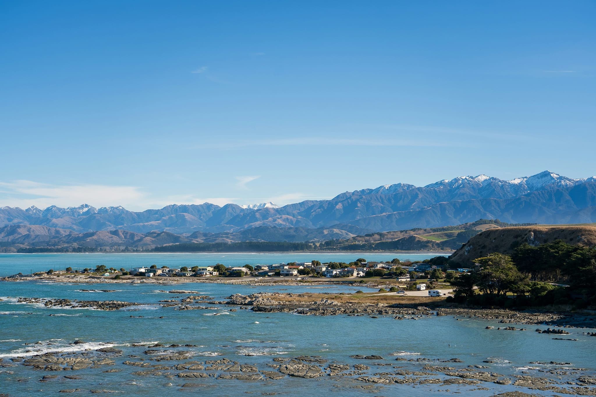 blue water and distant mountains in Kaikoura