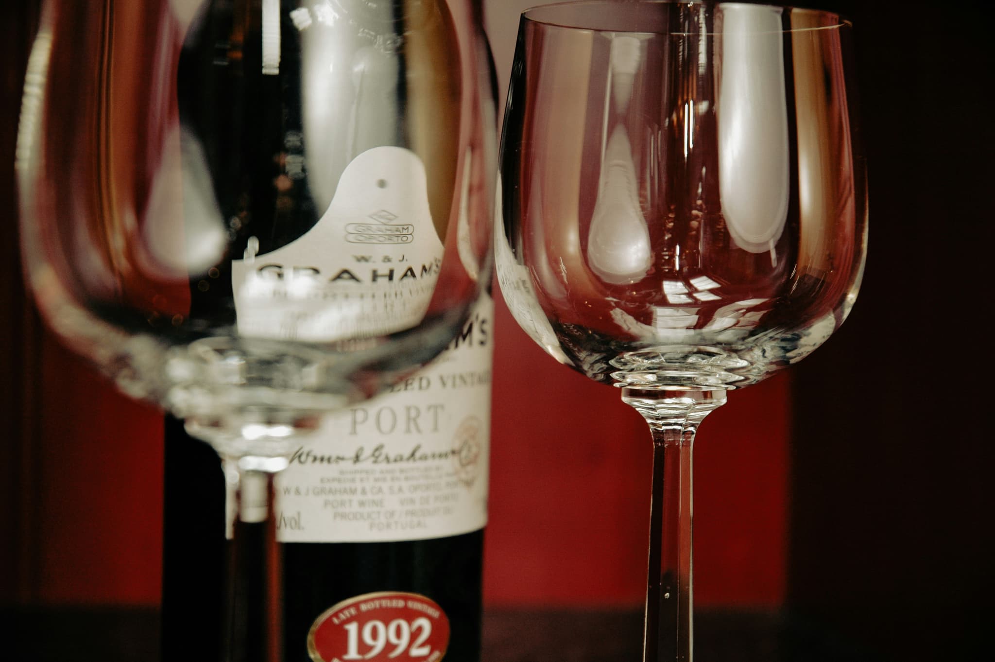Port wine bottle and two wine glasses