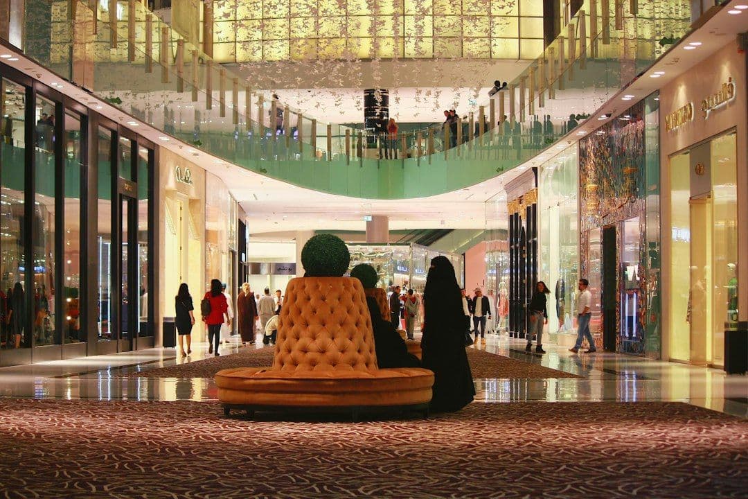 Shoppers walking through Dubai Mall's Fashion Avenue