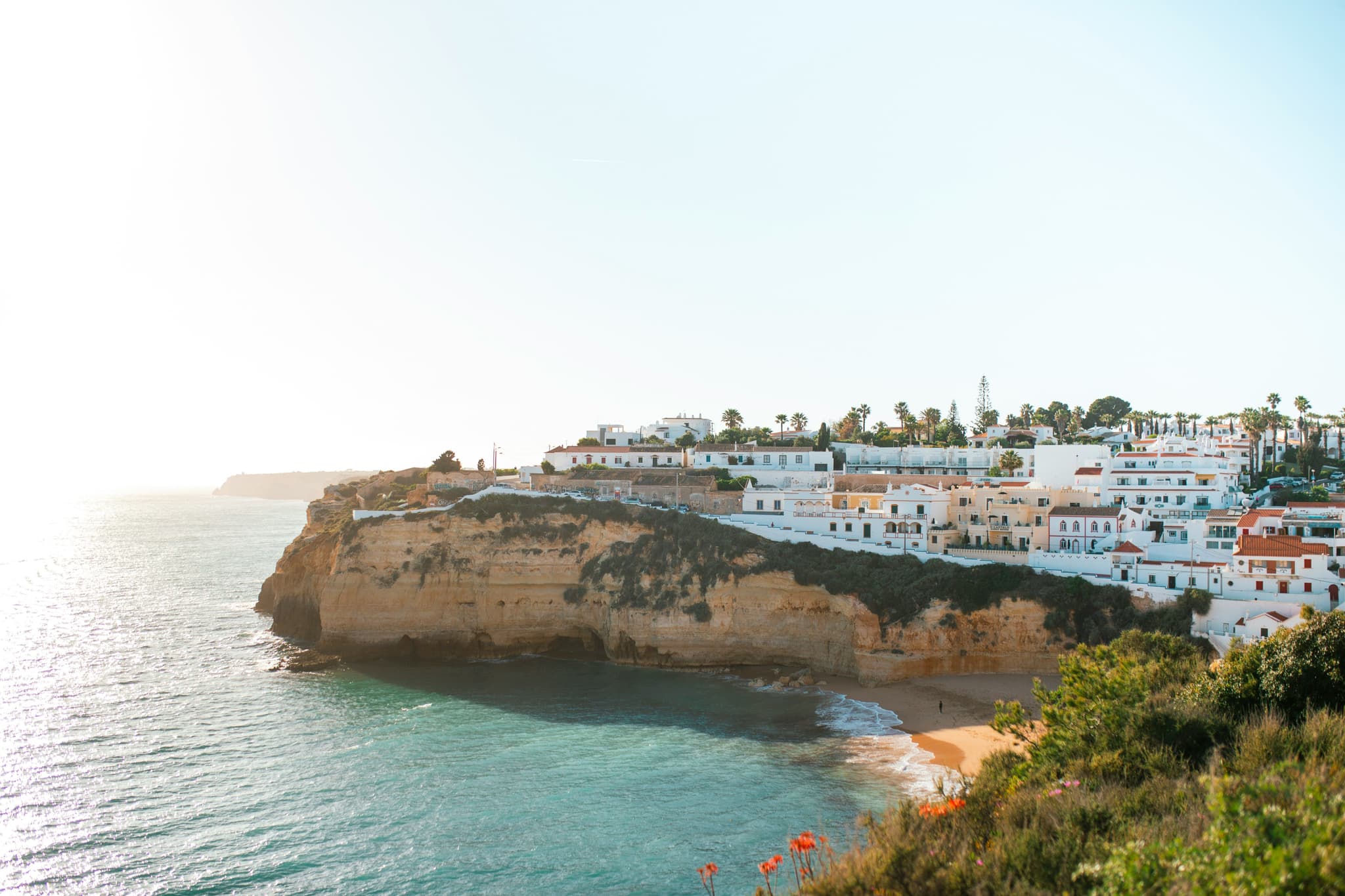 A cliff with houses and sea in Carvoeiro